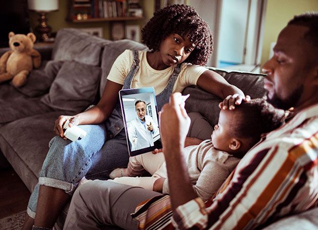 Family on Telehealth call with doctor
