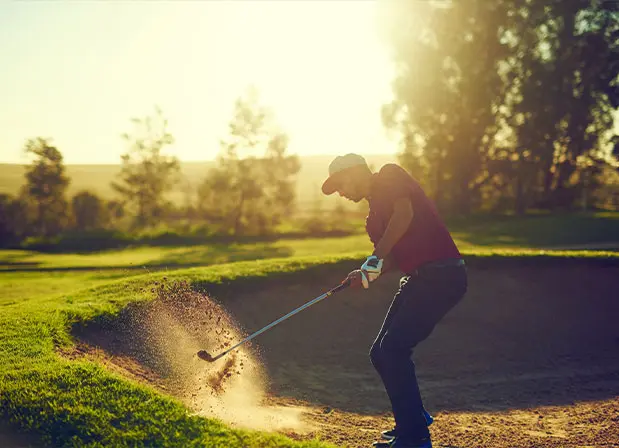 Man swinging golf club