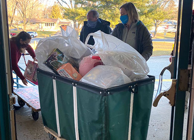 WPS employees donate gifts to Henderson Elementary students