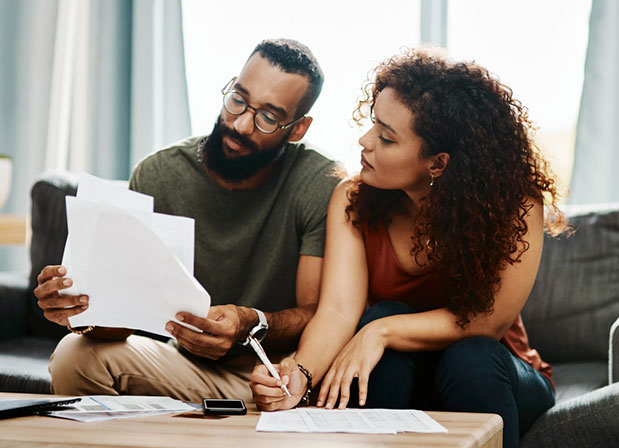Couple reviewing paperwork