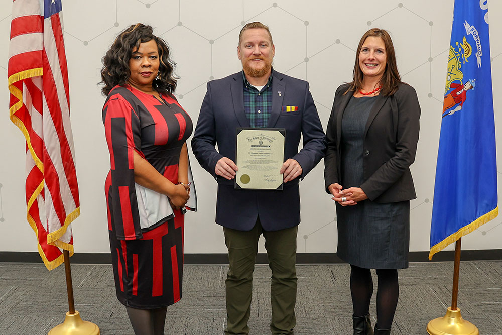 Michele Carter, Adminstrator of the Division of Employment and Training for the Department of Workforce Development; Tim La Sage, WPS Military Affairs Manager, and Pamela McGillivray, Deputy Secretary for the Department of Workforce Development.